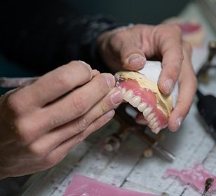 Lab tech carving dentures