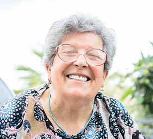 Woman smiling outside