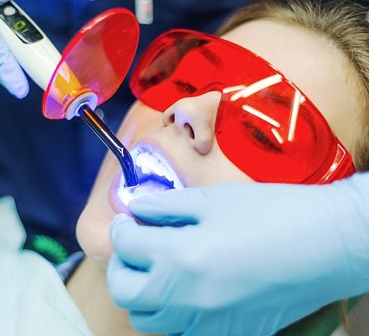 Patient receiving dental bonding