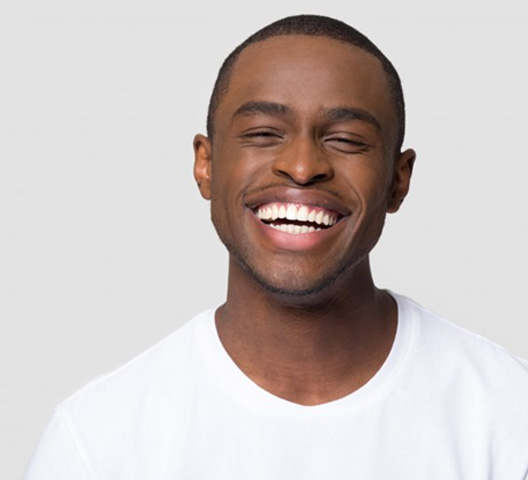 Man smiling on white background