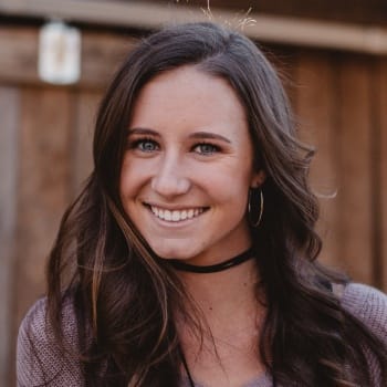 Young woman with a healthy smile wearing a choker