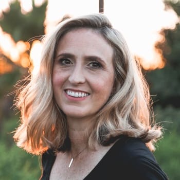 Woman with gorgeous smile wearing a black blouse