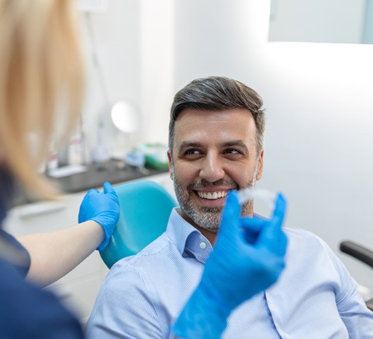 Patient in Doylestown smiling with  Invisalign