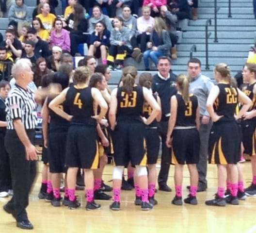 Doctor Rakowsky coaching at girls basketball game