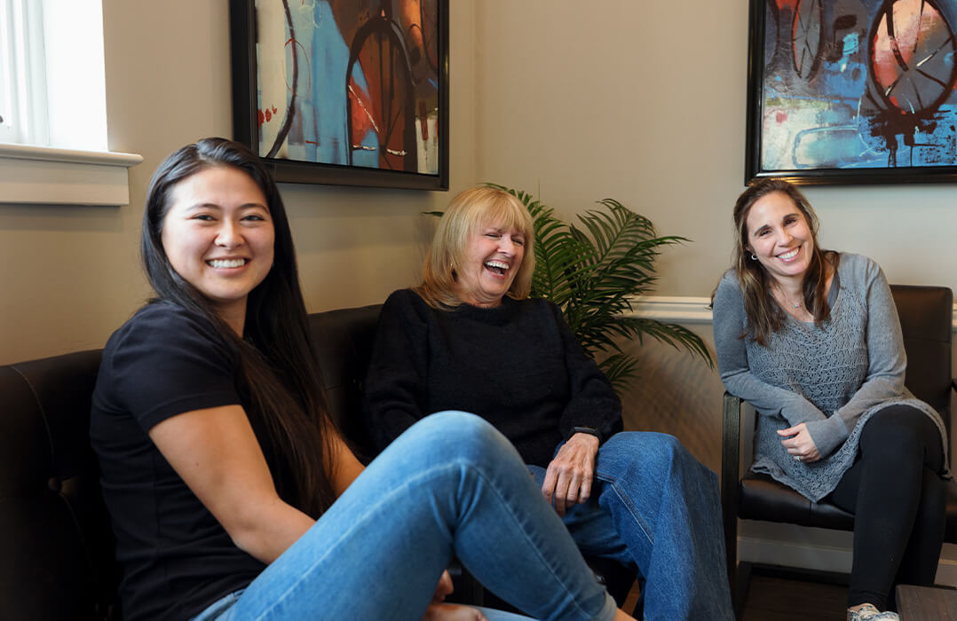 3 women smiling