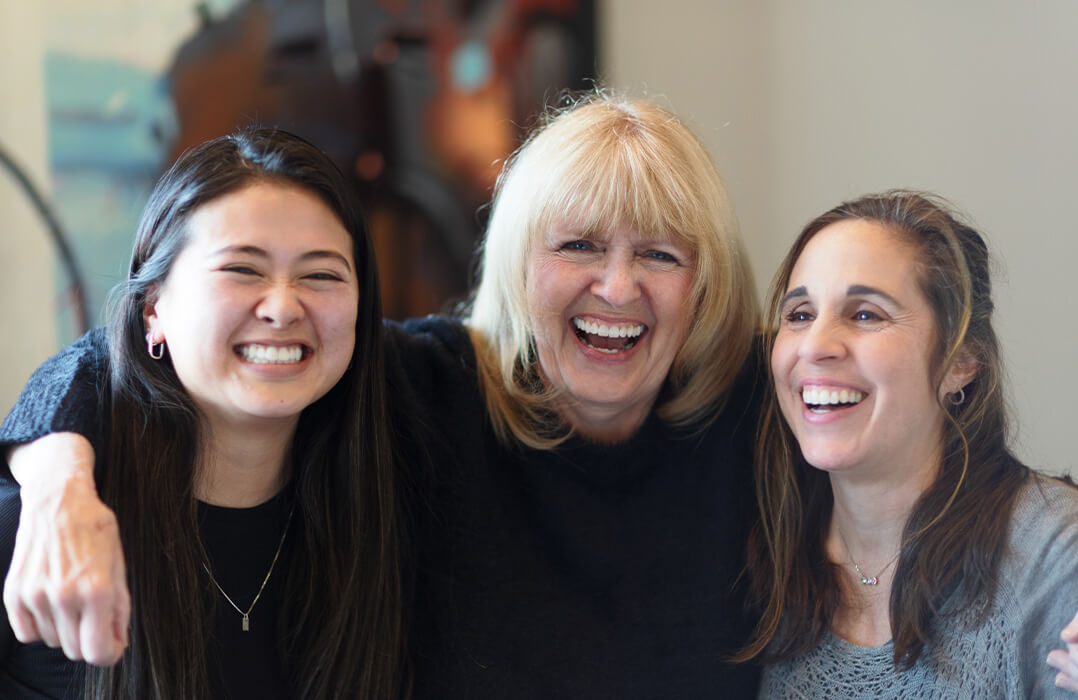 3 women smiling