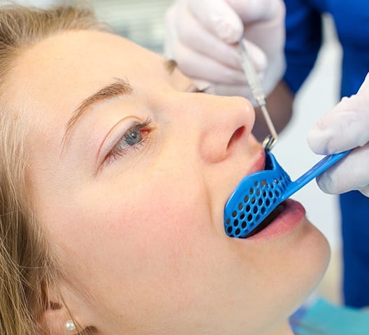 Patient receiving fluoride treatment