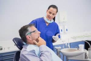 woman talking to her dentist 